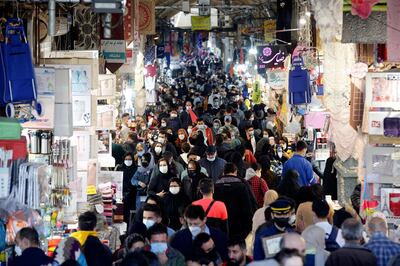 epa09045996 Iranians wearing face masks go shopping in old grand bazaar in Tehran, Iran, 02 March 2021. According to Iranian foreign ministry Iran has rejected an offer by the European Union to engage in direct talks with the United States over the 2015 nuclear deal, saying that US should lift sanctions before any kind of talks. Iran is struggling with hard economic crisis over though sanctions by US administrations as the tensions between Iran and US is going on over Iran's dispute nuclear program.  EPA/ABEDIN TAHERKENAREH