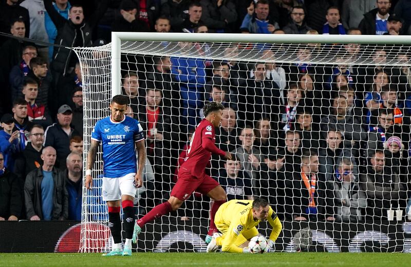 Roberto Firmino celebrates scoring Liverpool's second goal  at Ibrox. PA