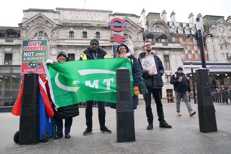 RMT members on the picket line outside Victoria Station in London. PA
