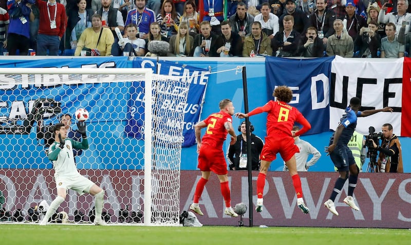Belgium's Thibaut Courtois can only watch as the ball hits the back of the net. AP Photo
