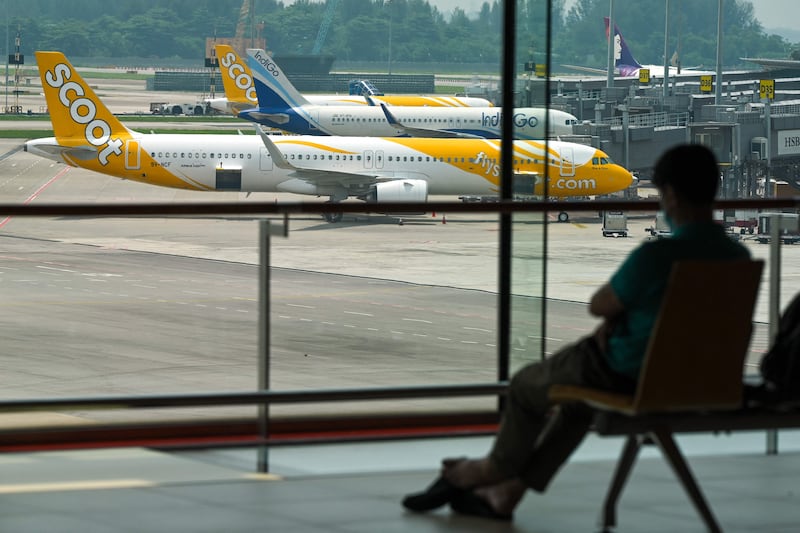 Passenger planes parked at Changi International Airport in Singapore. AFP