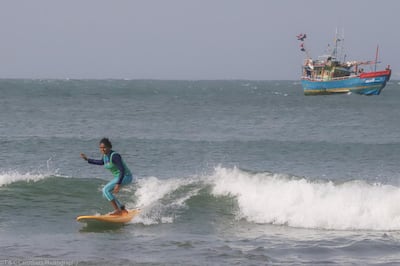 Sri Lanka's female surfers typically wear leggings and a shirt when they take to the waves. Courtesy Tiffany Carothers