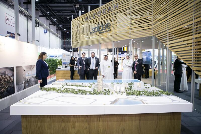 Above, a scale version of the Al Zorah Beach Residences project in Sharjah on display at Cityscape Global 2015. Reem Mohammed / The National
