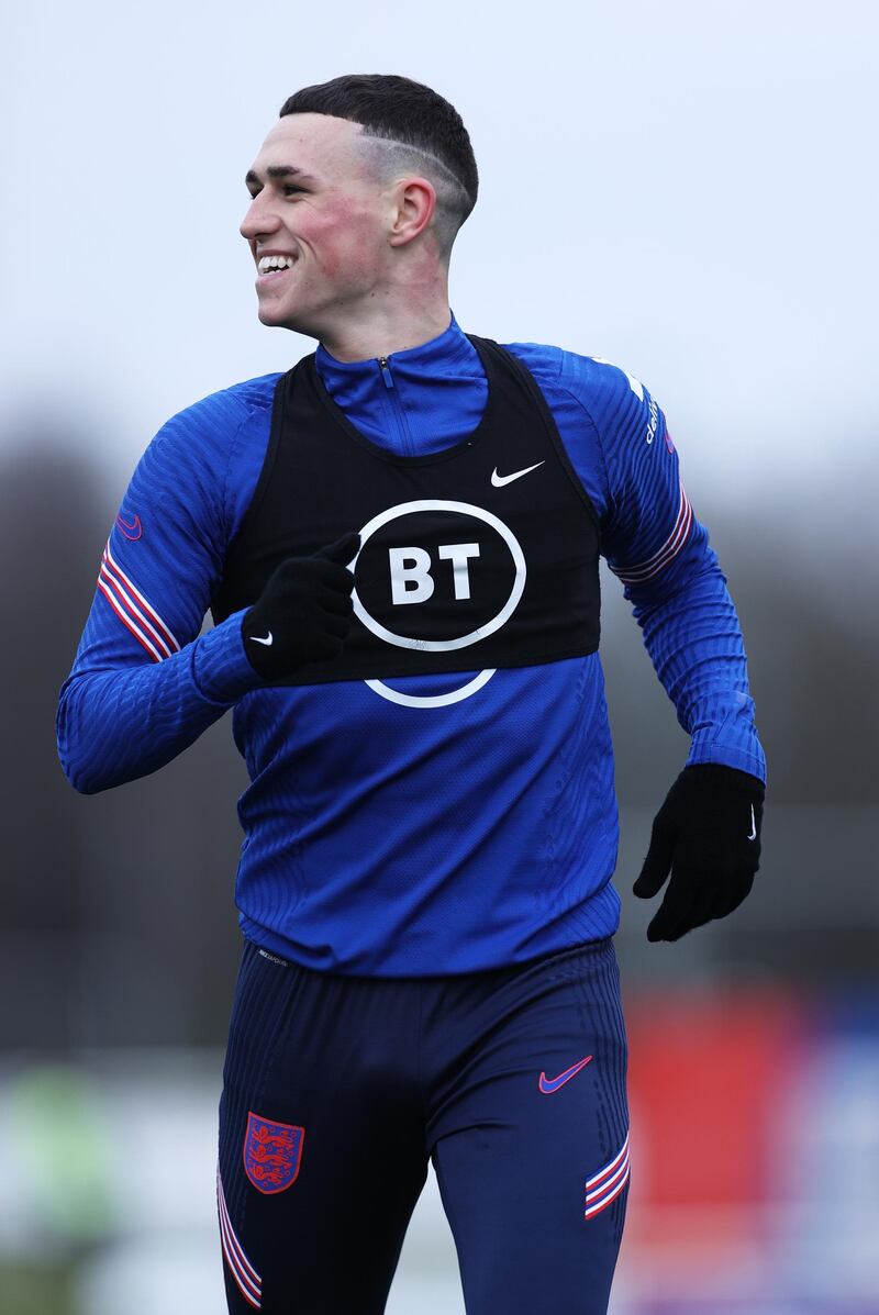 BURTON UPON TRENT, ENGLAND - MARCH 23: Phil Foden of England looks on during a training session ahead of an upcoming FIFA World Cup Qatar 2022 Euro Qualifier against San Marino at St George's Park on March 23, 2021 in Burton upon Trent, England. (Photo by Eddie Keogh - The FA/The FA via Getty Images)