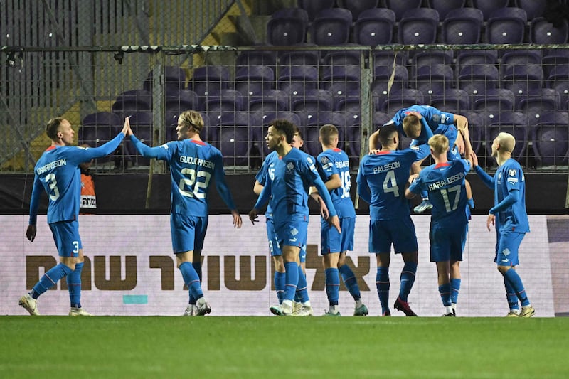 Iceland players celebrate a goal during the Euro 2024 qualifier play-off semi-final against Israel. AFP