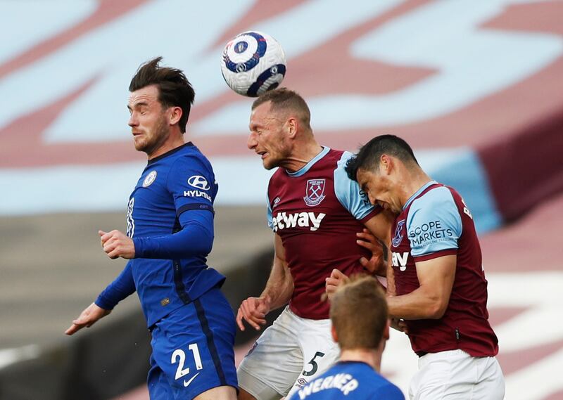 Chelsea's Ben Chilwell against West Ham United's Vladimir Coufal and Fabian Balbuena. Reuters