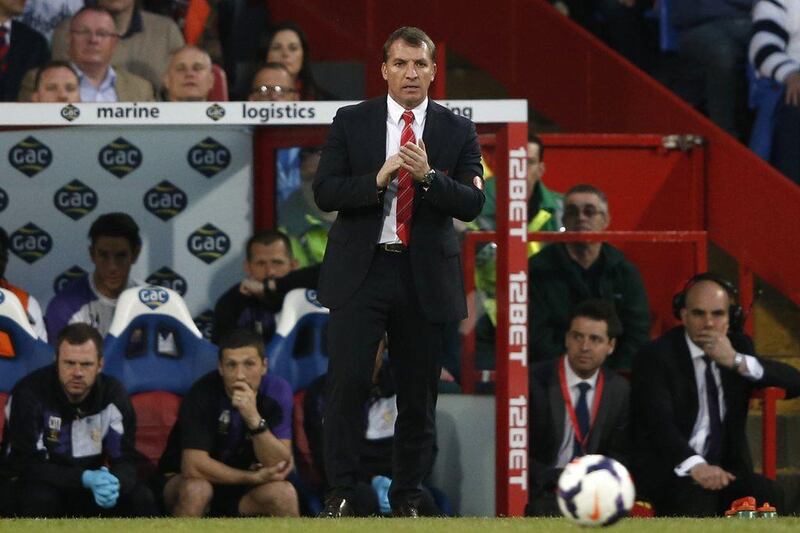 Liverpool trail Manchester City by two points heading into the Premier League's final day of the season. Adrian Dennis / AFP