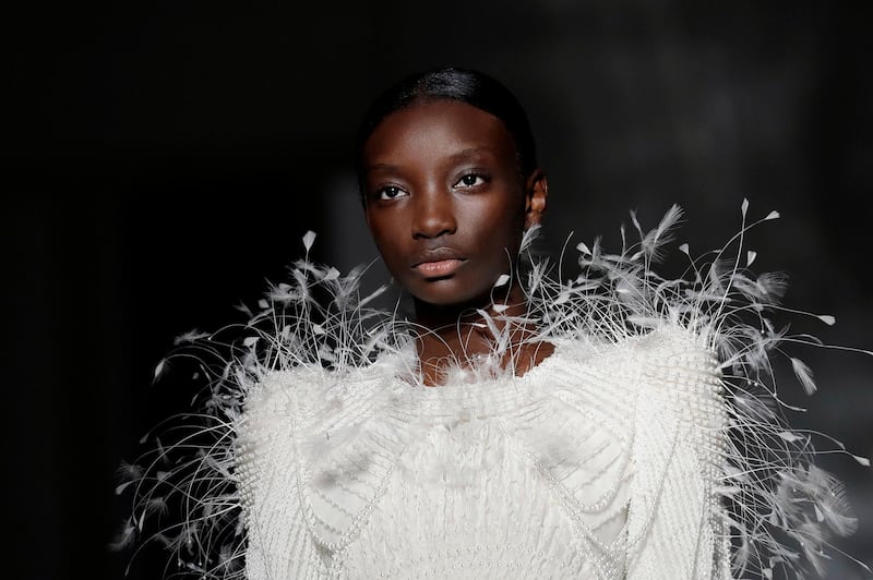 TOPSHOT - A model presents a creation by Givenchy during the 2019 Spring-Summer Haute Couture collection fashion show in Paris, on January 22, 2019. / AFP / Thomas SAMSON
