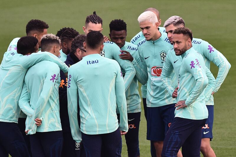 Brazil players huddle during training. Reuters