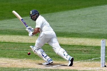 (FILES) In this file photo taken on December 27, 2018 India's batsman Rohit Sharma plays a shot during day two of the third cricket Test match between Australia and India in Melbourne. One-day big hitter Rohit Sharma will stake a claim to become India's first-choice opening Test batsman when they start a series against South Africa on October 2 looking for a record breaking win. Victory in the three-match series would see India break Australia's record of 10 straight series wins on home territory. - -- IMAGE RESTRICTED TO EDITORIAL USE - STRICTLY NO COMMERCIAL USE -- / AFP / WILLIAM WEST / -- IMAGE RESTRICTED TO EDITORIAL USE - STRICTLY NO COMMERCIAL USE --