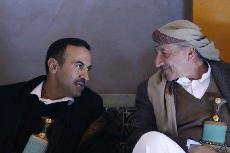 Brigadier Ahmed Ali Abdullah Saleh, left, the eldest son of the former president, Ali Abdullah Saleh, and commander of the Republican Guard, talks to a guest in Sanaa in January.