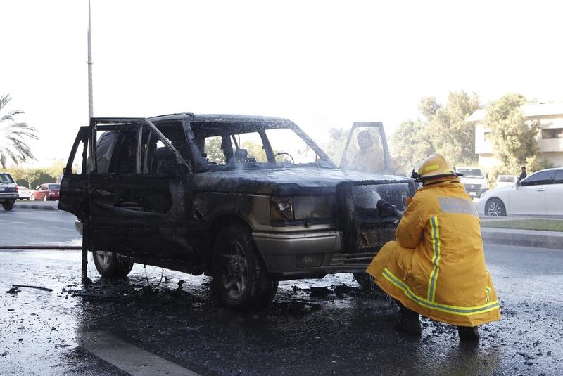  Fire gutted a  four-wheel drive in Sharjah. Jeffrey E Biteng / The National 