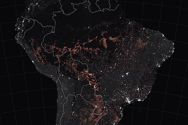 Photo taken by Nasa Earth Observatory showing active fire detections in Brazil, observed by satellites. Nasa earth Observatory via EPA