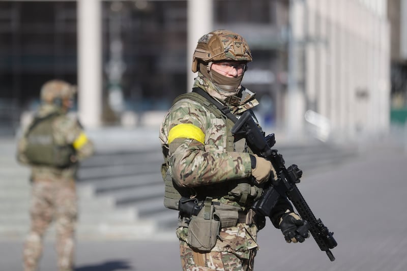 Ukrainian soldiers stand at Maidan Nezalezhnosti, or Independence Square, in Kiev. EPA