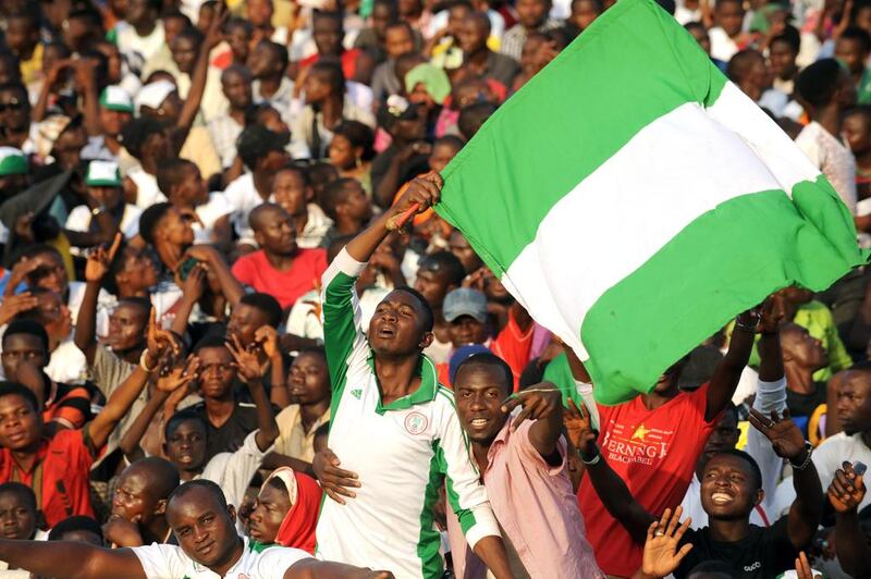 Nigerian supporters celebrate a goal against Egypt during the African Cup of Nations qualification match between Egypt and Nigeria, on March 25, 2016, in Kaduna. AFP / PIUS UTOMI EKPEI
