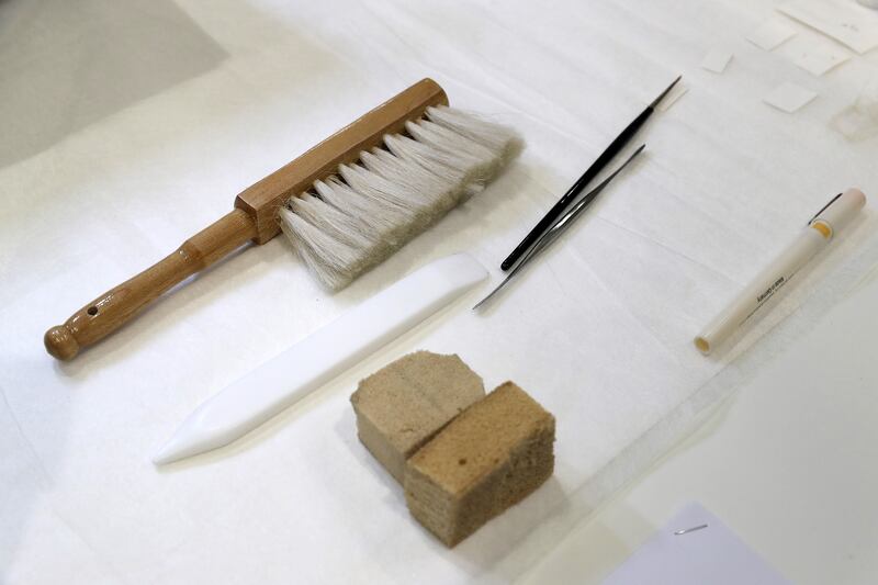 Some of the tools used to clean old books and documents 