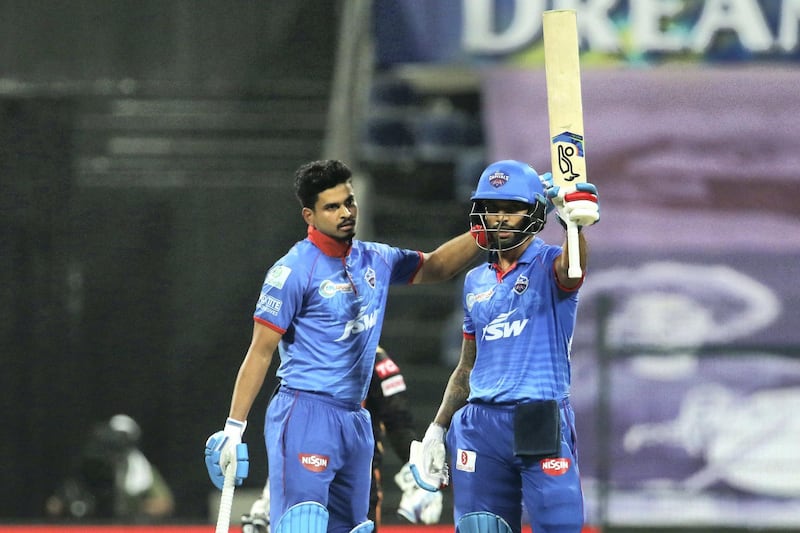 Shikhar Dhawan of Delhi Capitals raises his bat after scoring a fifty during the qualifier 2 match of season 13 of the Dream 11 Indian Premier League (IPL) between the Delhi Capitals and the Sunrisers Hyderabad at the Sheikh Zayed Stadium, Abu Dhabi in the United Arab Emirates on the 8th November 2020.  Photo by: Vipin Pawar  / Sportzpics for BCCI