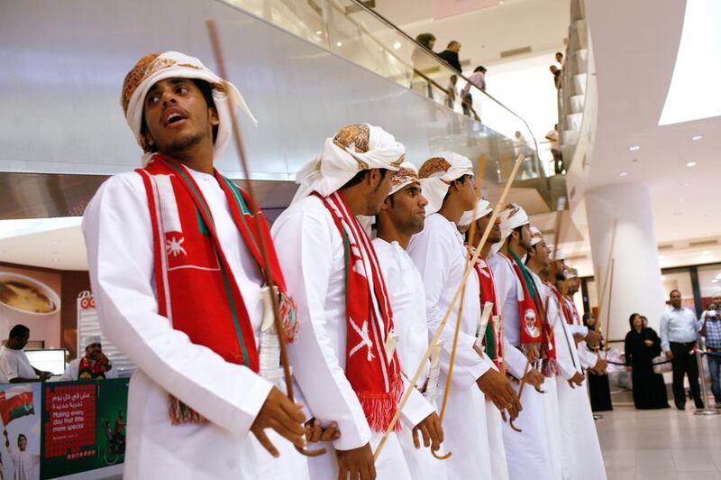 Omanis perform traditional dances at Qurum city centre mall in Muscat to mark the country's 44th annual National Day. Justin Vela / The National