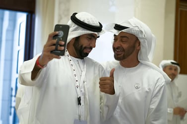 UAE residents have been paying tribute to Sheikh Mohamed bin Zayed, right, on his birthday. Ministry of Presidential Affairs