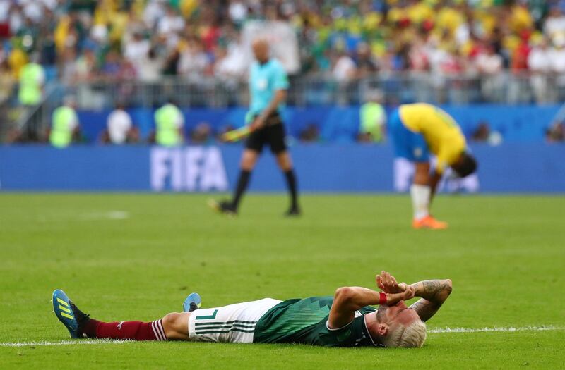 Mexico's Miguel Layun looks dejected after the match. Pilar Olivares / Reuters