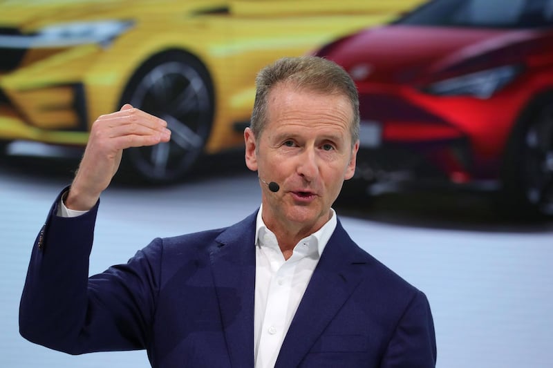 Herbert Diess, chief executive officer of Volkswagen AG (VW), gestures while speaking during the automaker’s annual news conference in Wolfsburg, Germany, on Tuesday, March 12, 2019.  Volkswagen’s profitability for the main VW, Audi and Porsche brands fell last year amid strains for the transition to electric cars and the German carmaker’s push for a deeper overhaul. Photographer: Krisztian Bocsi/Bloomberg