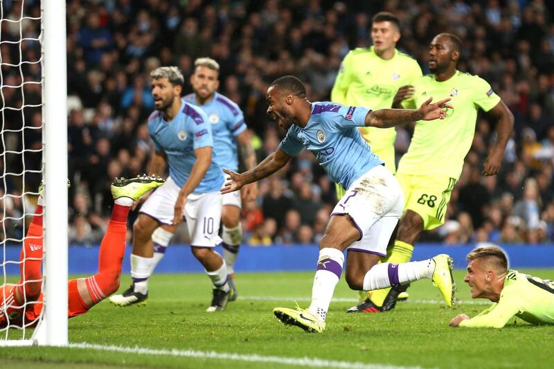 Raheem Sterling begins his celebrations after scoring Manchester City's first goal. Getty Images