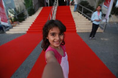 A Gaza girl poses on the red carpet in 2016. Courtesy Gaza Film Festival.