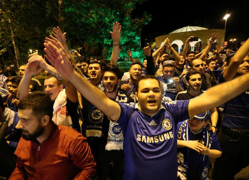 Chelsea fans cheer as the Chelsea squad arrive in Baku ahead of the Europa League final. Reuters