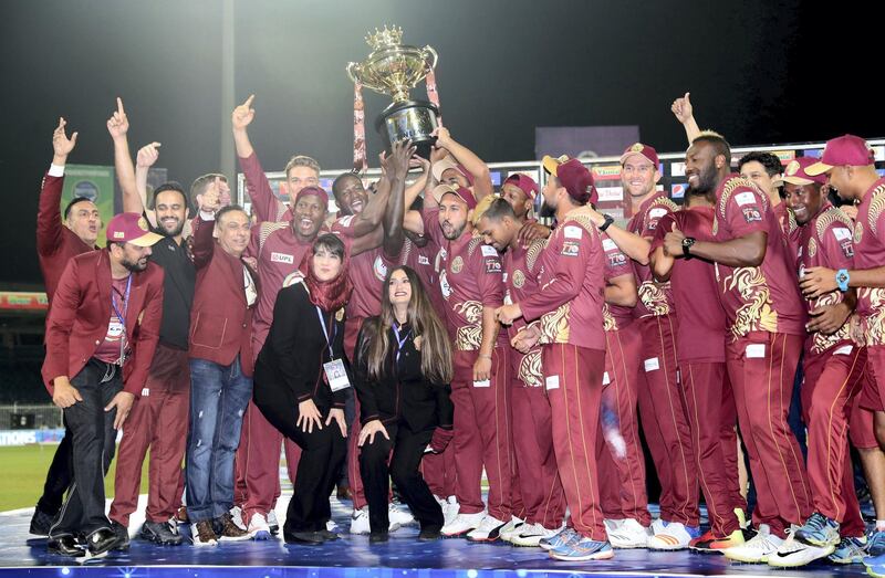 Sharjah, United Arab Emirates - December 02, 2018: Warriors celebrates winning the trophy after the game between between Pakhtoons and Northern Warriors in the T10 final. Sunday the 2nd of December 2018 at Sharjah cricket stadium, Sharjah. Chris Whiteoak / The National