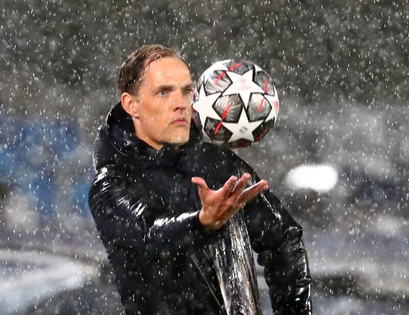 Chelsea manager Thomas Tuchel takes a soaking in the rain during his team's 1-1 Champions League semi-final, first leg draw against Real Madrid at the Estadio Alfredo Di Stefano, on Tuesday, April 27. Reuters