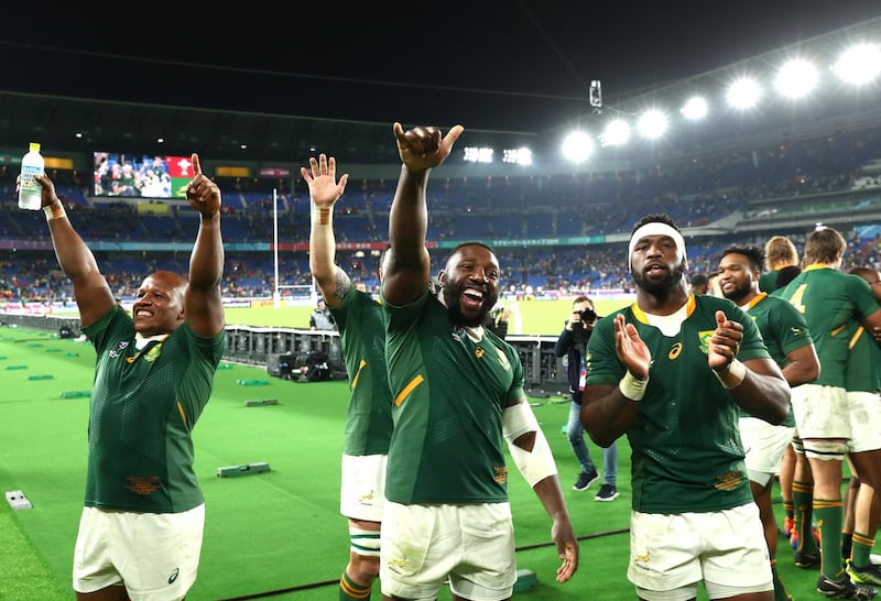 YOKOHAMA, JAPAN - OCTOBER 27: Mbongeni Mbonambi of South Africa (L) celebrates with Tendai Mtawarira (C) and Siya Kolisi, captain of South Africa (R) during the Rugby World Cup 2019 Semi-Final match between Wales and South Africa at International Stadium Yokohama on October 27, 2019 in Yokohama, Kanagawa, Japan. (Photo by Stu Forster/Getty Images)