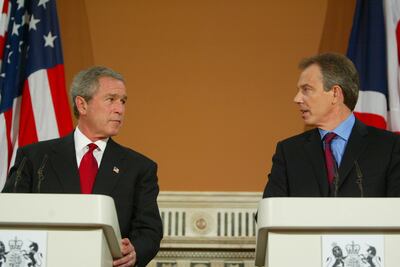 George W Bush and Tony Blair speak at a press conference at the Foreign Office in London in 2003. Getty Images