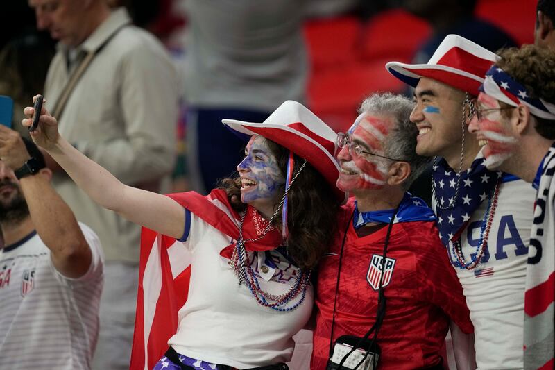 USA fans take a selfie at the Ahmad bin Ali Stadium in Doha, Qatar. AP