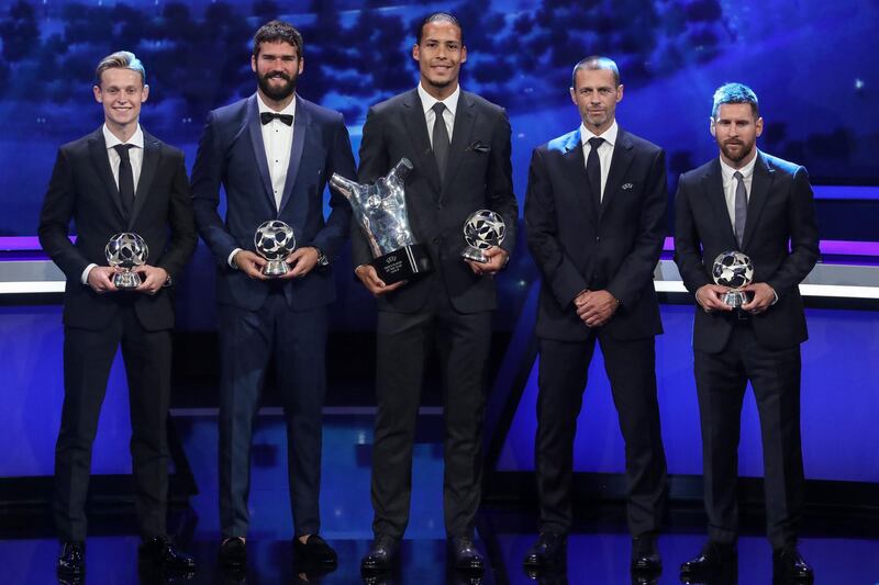 From left: Dutch midfielder Frenkie de Jong, Brazilian goalkeeper Alisson, Dutch defender Virgil van Dijk, Uefa President Aleksander Ceferin and Argentinian forward Lionel Messi pose after an awards ceremony. AFP