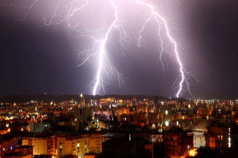 Lightning flashes during a thunderstorm over Tirana, Albania. Reuters