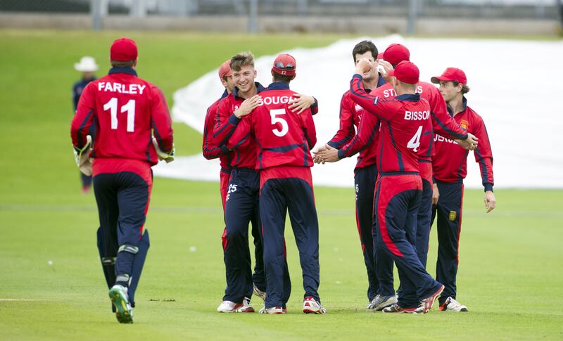 Jersey player celebrate a wicket during a warmup match against Scotland. Donald MacLeod / ICC