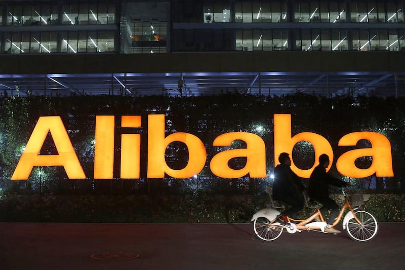 Chinese e-commerce giant Alibaba reported its fastest growth in four years, with revenues up but profit down on payout of employee benefits. Aly Song / Reuters