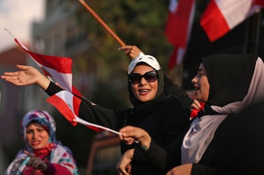 Lebanese women take part in a demonstration to demand better living conditions and the ouster of a cast of politicians who have monopolised power and influence for decades, on October 21, 2019 in downtown Beirut. Lebanon's teetering government met today to approve a belated economic rescue plan as thousands gathered for a fifth day of mass protests against the ruling elite. / AFP / Patrick BAZ