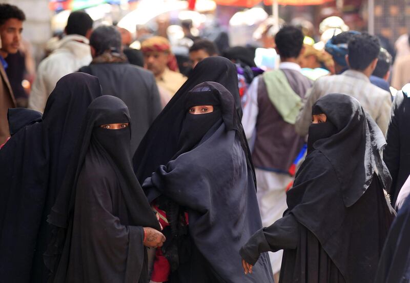 Yemeni women shop in the market in Sanaa where Houthi rebels are imposing strict rules on dress and gender segregation. AFP