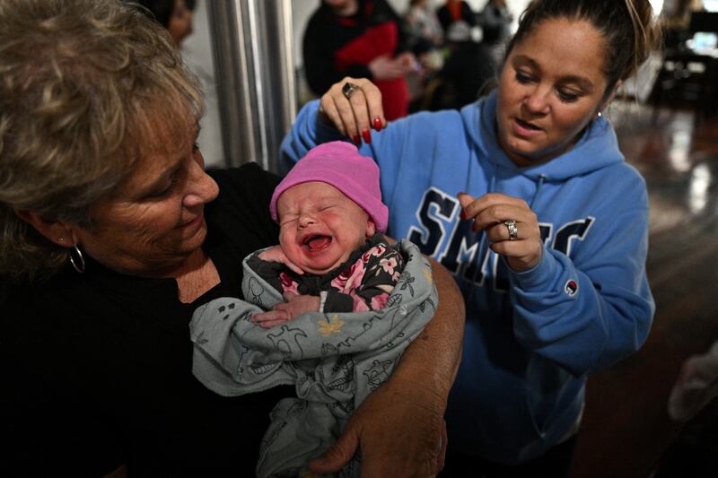 One-week-old Mylie survived the storm in Sullivan. Reuters