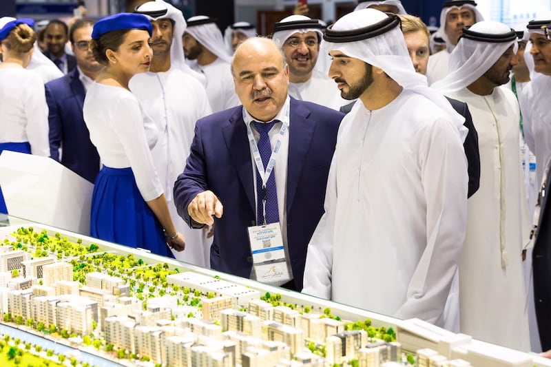 Sheikh Hamdan bin Mohammed, Crown Prince of Dubai, is pictured with Mirwais Azizi, chairman of Azizi Developments at the developer’s stand at Cityscape Global. The developer said it has sold out phase one of its Riviera project. It said it has also sold 50 per cent of its phase two units on the first day of Cityscape. The project is located in the Meydan One district. Once complete, the project will deliver at least 6,273 units of studio, one and two-bedroom apartments situated along the Dubai Canal, with views of Downtown Dubai and other landmarks. Courtesy Azizi