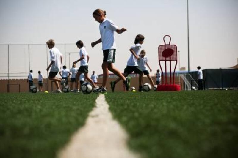 October 20, 2010, Abu Dhabi, UAE:

Manchester United has launched a program to set up a soccer school in Abu Dhabi to teach young children how to play like the pros. 

Andy Dixon, of Newcastle, and Chris Rosimus, of Manchester, are the representatives of the team out here and also the kids' trainers. 

Today Manchest United's school paid a visit to the Al Raha Internaitonal school to do a few drill with the eager students.

Within a year's time Manchester United hopes to have the school set up, and perhaps expnd to other parts of the UAE.


Lee Hoagland/ The National
 
