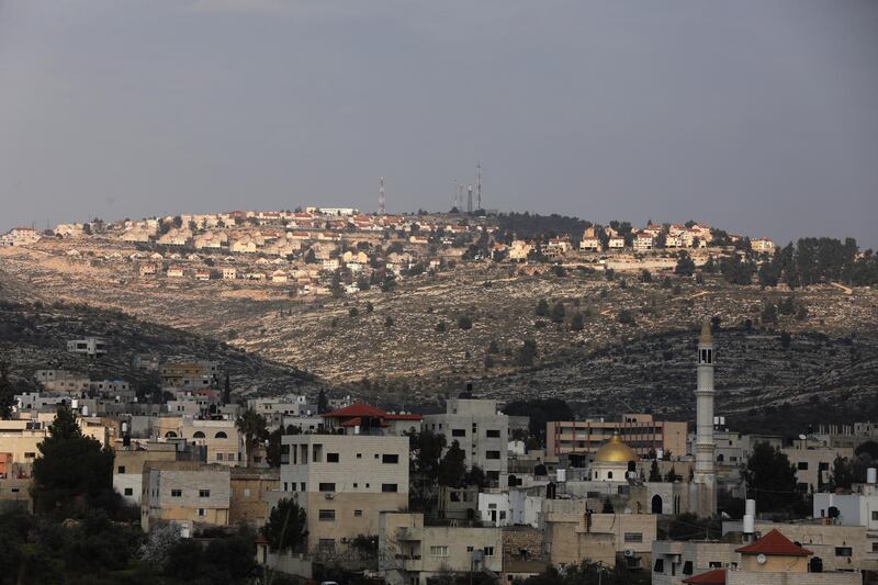 epa08222138 A general view of the Israeli settlement of Elon Moreh (back) as seen from the Palestinian village of Azmout near the West Bank City of Nablus, 16 February 2020. According to reports, Israeli Prime Minister Benjamin Netanyahu said an Israeli team will be working with US counterparts on 'sovereignty maps' including the Jordan Valley, the northern Dead Sea and all Jewish settlement in West Bank in light of the US President Trump's Middle East peace plan.  EPA/ALAA BADARNEH