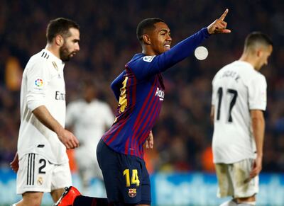 epa07348741 Real Madrid's Malcom Filipe Silva de Oliveira (C) celebrates after scoring the 1-1 tie during a Spanish King's Cup semifinal first leg soccer match between FC Barcelona and Real Madrid at the Nou Camp stadium in Barcelona, Catalonia, north eastern Spain, 06 February.  EPA/Enric Fontcuberta