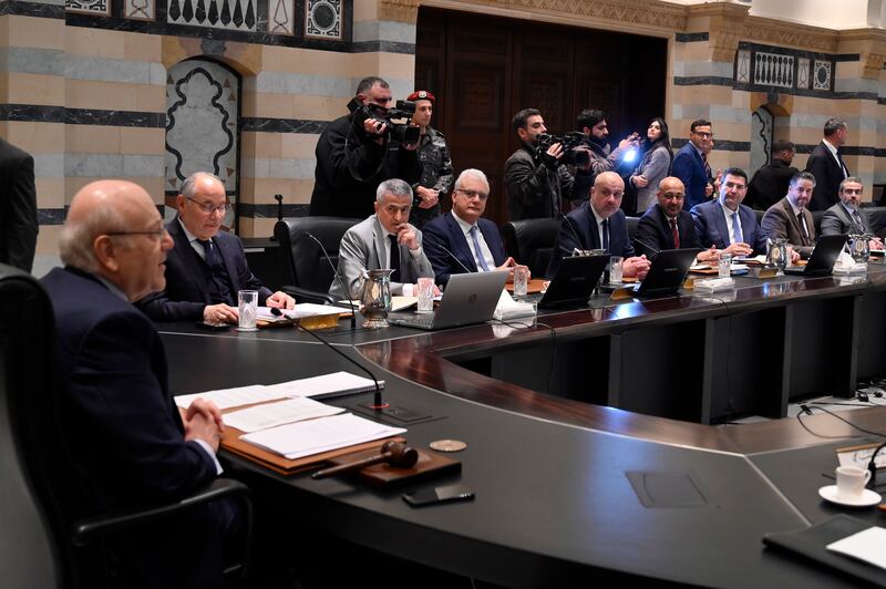 Lebanese caretaker Prime Minister, Najib Mikati (L) heads Wednesday's cabinet meeting at the government palace in central Beirut. EPA