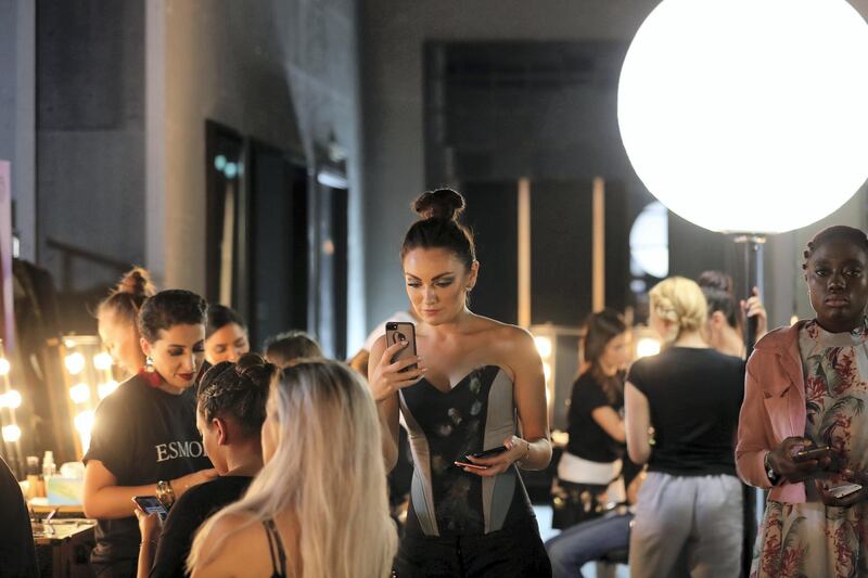 Dubai, United Arab Emirates - June 20, 2019: People prepare for the show. Esmod Fashion Show. Thursday the 20th of June 2019. City Walk, Dubai. Chris Whiteoak / The National