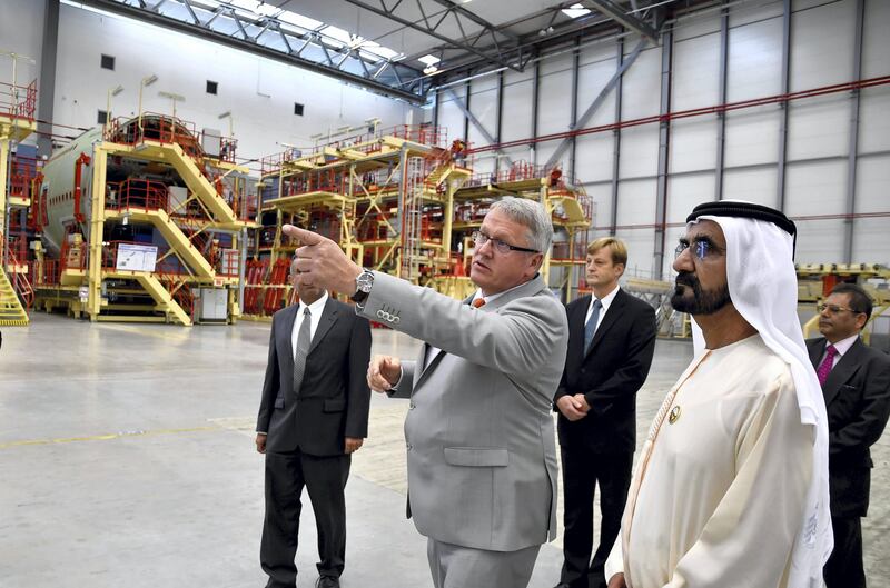Sheikh Mohammed is briefed on the interior design of the A380 fleet and its exterior painting by Andreas Fehring, Head of Airbus Plant Hamburg, and Andreas Foerster, Chairman of Airbus Group. Wam