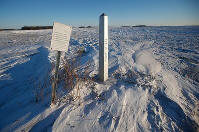 A border marker, between the US and Canada is shown outside of Emerson, Manitoba. AP