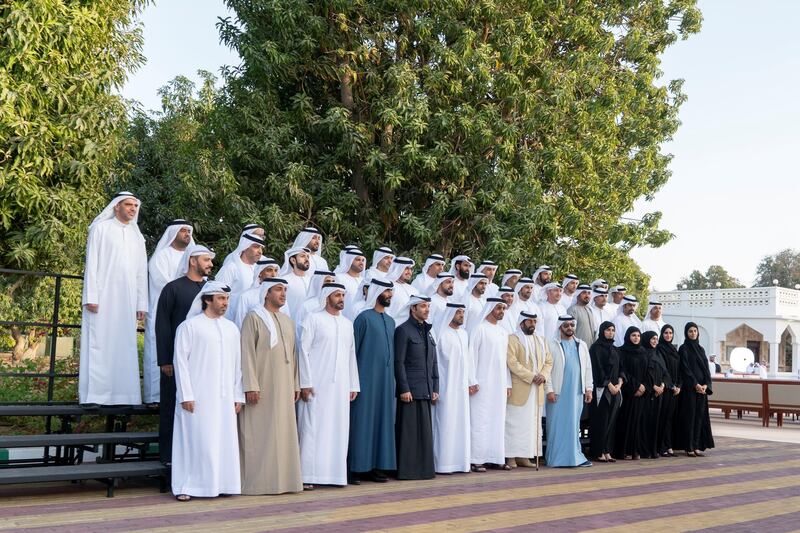 AL AIN, ABU DHABI, UNITED ARAB EMIRATES - January 20, 2019: HH Sheikh Mohamed bin Zayed Al Nahyan, Crown Prince of Abu Dhabi and Deputy Supreme Commander of the UAE Armed Forces (front row 7th L), stands for a photograph with members of Al Ain Municipality, during a barza held at Al Maqam Palace. Seen with HH Sheikh Hazza bin Zayed Al Nahyan, Vice Chairman of the Abu Dhabi Executive Council (front row 5th L), HE Falah Mohamed Al Ahbabi, Chairman of the Department of Urban Planning and Municipalities, and Abu Dhabi Executive Council Member (front row 6th L), HH Sheikh Tahnoon bin Mohamed Al Nahyan, Ruler's Representative in Al Ain Region (front row 8th L) and HH Sheikh Hamdan bin Zayed Al Nahyan, Ruler���s Representative in Al Dhafra Region (front row 9th L).
( Rashed Al Mansoori / Ministry of Presidential Affairs )
---