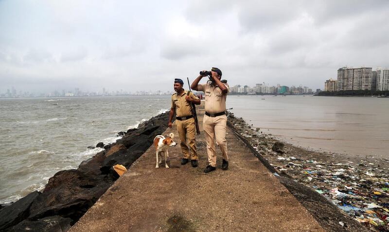 Indian police commandos patrol he Arabian Sea coast after a high alert was issued, in Mumbai, India, on September 23, 2016. The alert came after a suspicious group of men was spotted moving near a naval base at Uran in Raigad district, leading to a search operation. Divyakant Solanki / EPA